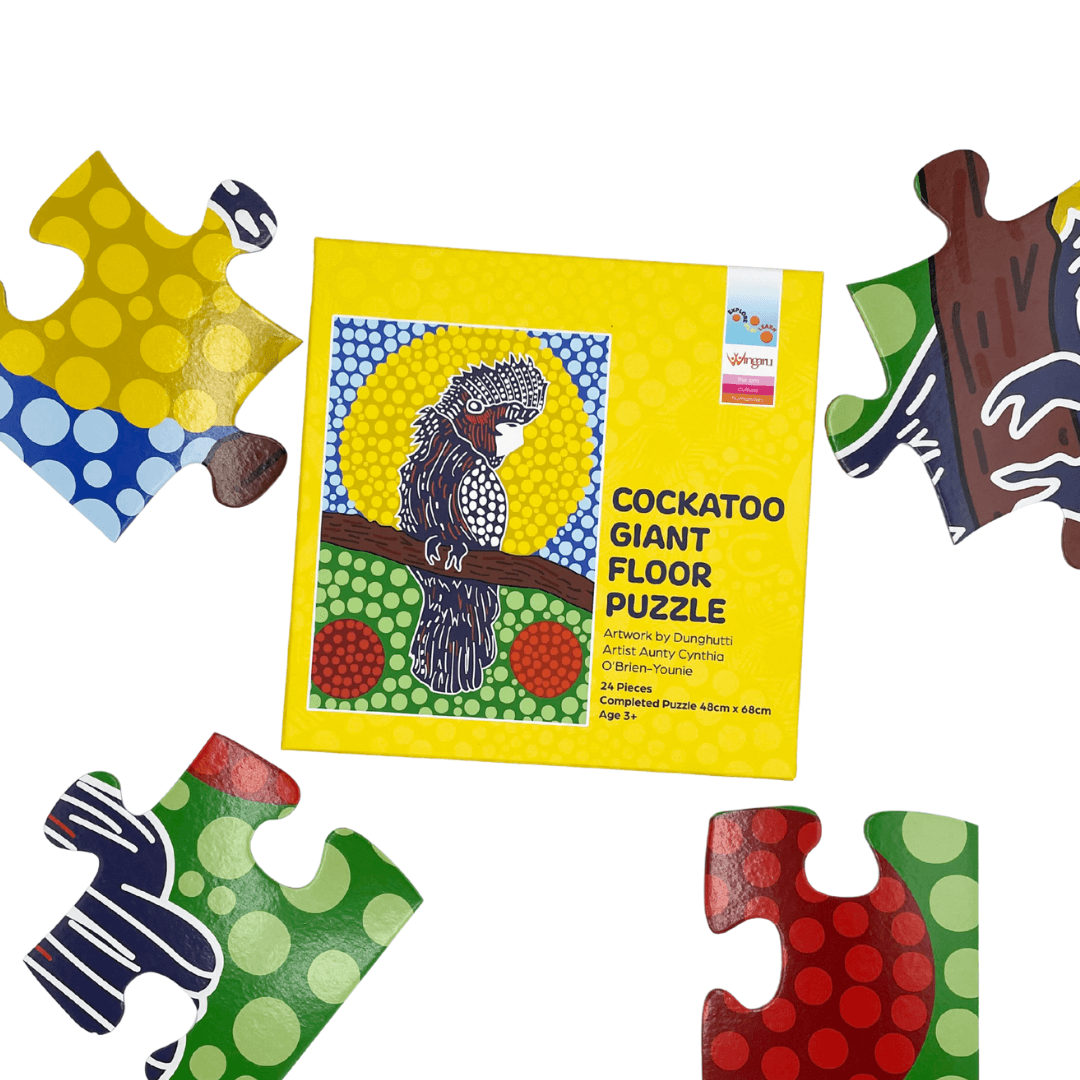 Wingaru Education Cockatoo giant floor puzzle box and pieces featuring Aboriginal artwork by Dunghutti artist Aunty Cynthia O’Brien-Younie.