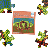 Wingaru Education Snake giant floor puzzle box and pieces featuring Aboriginal artwork by Dunghutti artist Aunty Cynthia O’Brien-Younie.