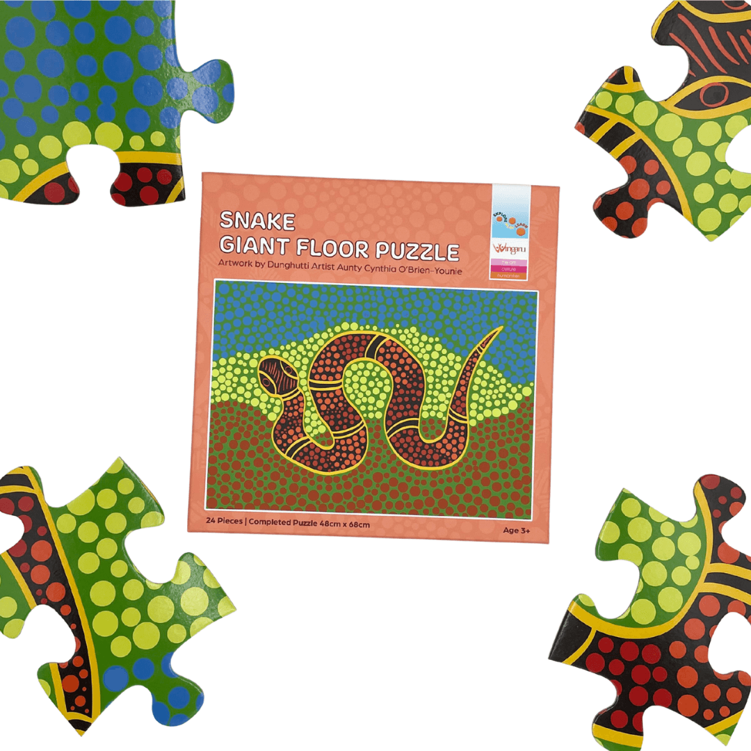 Wingaru Education Snake giant floor puzzle box and pieces featuring Aboriginal artwork by Dunghutti artist Aunty Cynthia O’Brien-Younie.